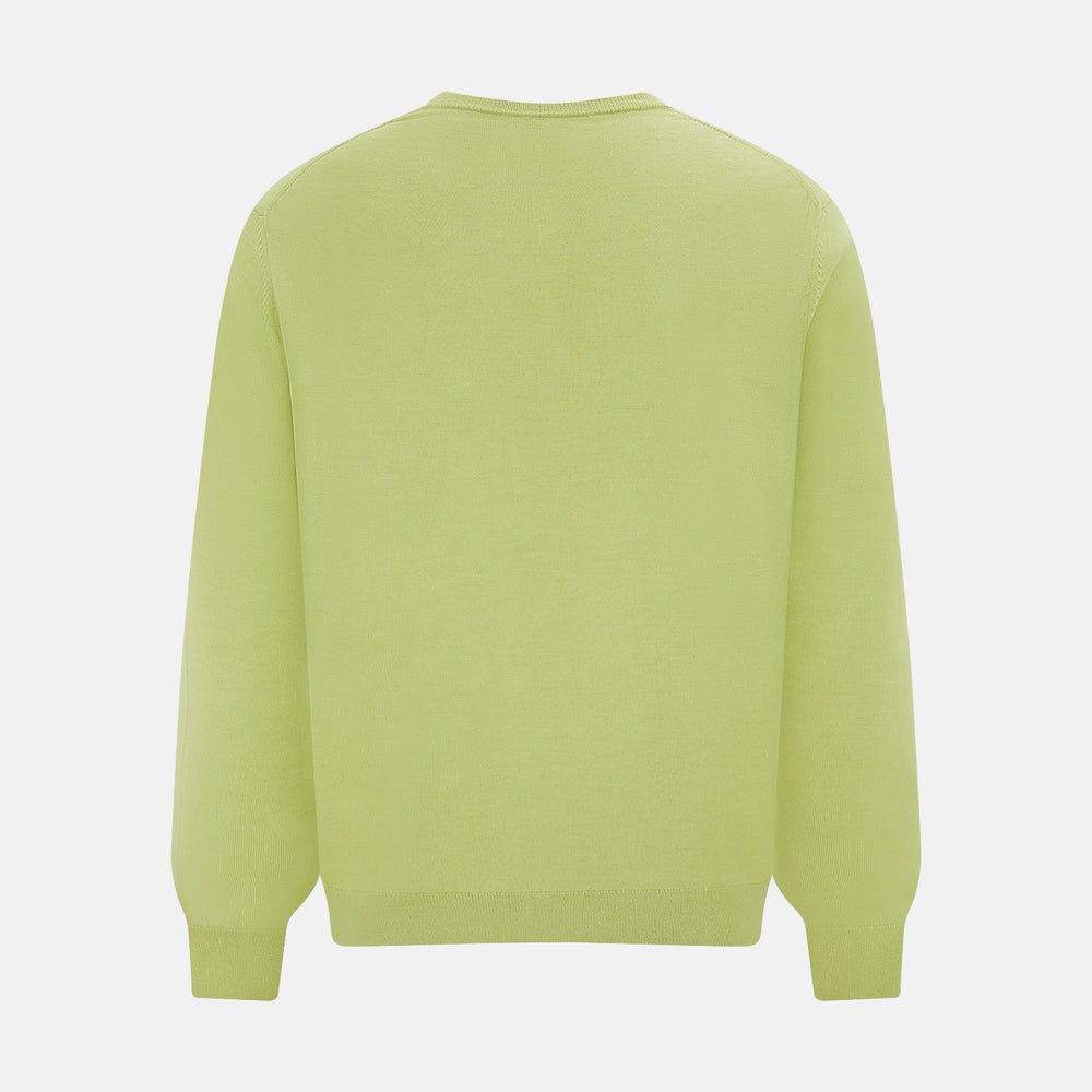 The Turnbull & Asser Melon Green Merino V-Neck Jumper is shown on a white background, featuring long sleeves, ribbed cuffs, and a ribbed hem.