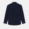 View 3 of product The Navy Westminster Shirt by Turnbull & Asser is a classic long-sleeve, button-up shirt with a pointed collar and buttoned cuffs, exemplifying British craftsmanship, shown against a plain white background.