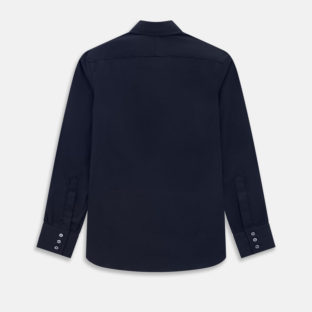 The Navy Westminster Shirt by Turnbull & Asser is a classic long-sleeve, button-up shirt with a pointed collar and buttoned cuffs, exemplifying British craftsmanship, shown against a plain white background.