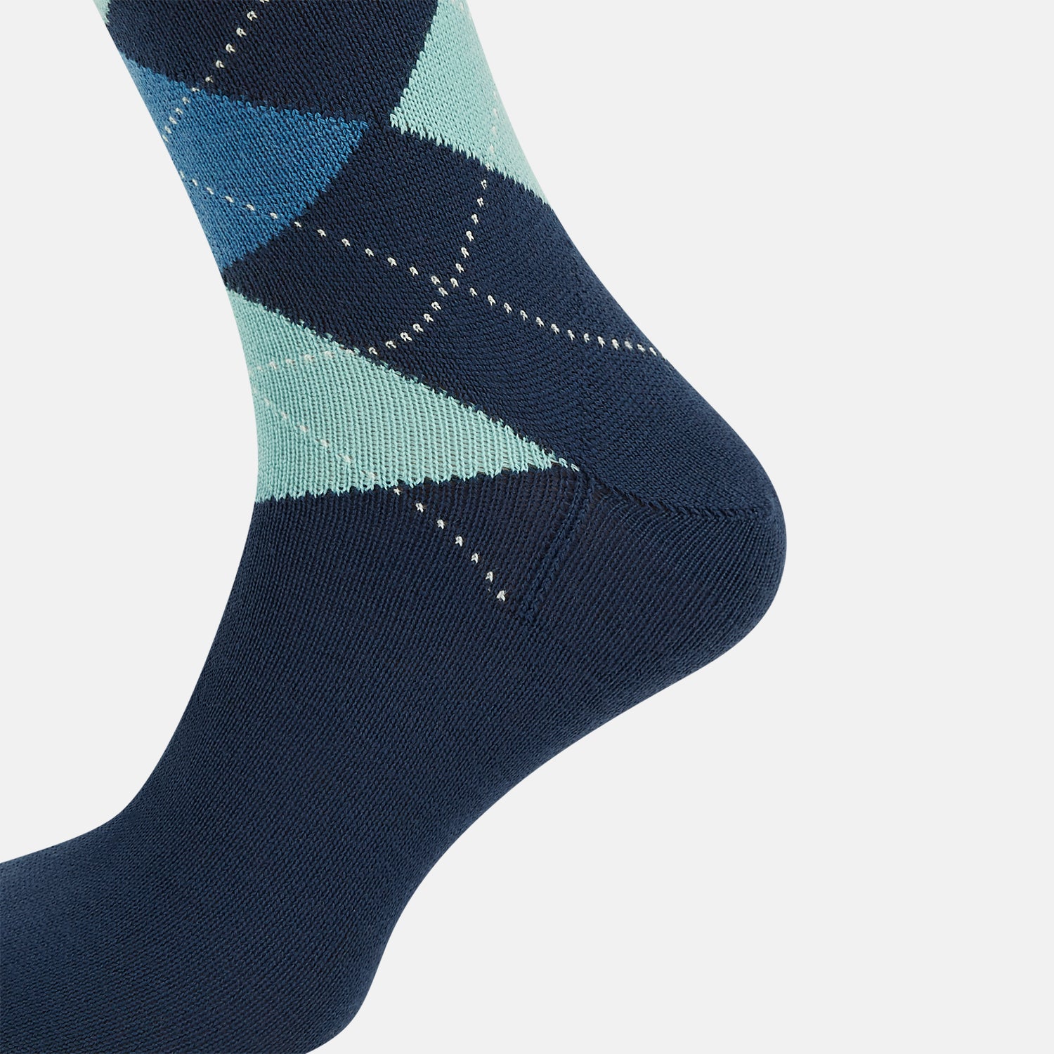 View 4 of product The Azzurro Wool Check Mid-Length Socks by Turnbull & Asser are navy blue with a ribbed cuff, featuring an argyle pattern in light blue, teal, and navy with white accents. Displayed upright against a plain white background.