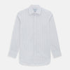 View 8 of product The Turnbull & Asser Pink and Blue Wide Pinstripe Mayfair Shirt features long sleeves, T&A collar, button-down front, and buttoned cuffs. It has bold pink and blue pinstripes on white and is laid flat on a white surface.