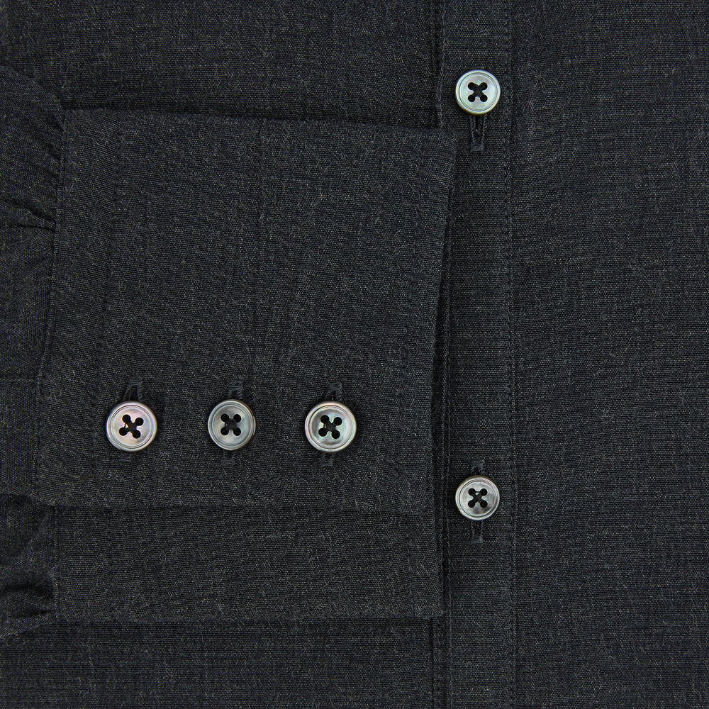 The Turnbull & Asser Midnight Blue Westminster Shirt features long sleeves, a button-up front, classic collar, and buttoned cuffs in a plain design—showcasing British craftsmanship—laid flat on a white background.