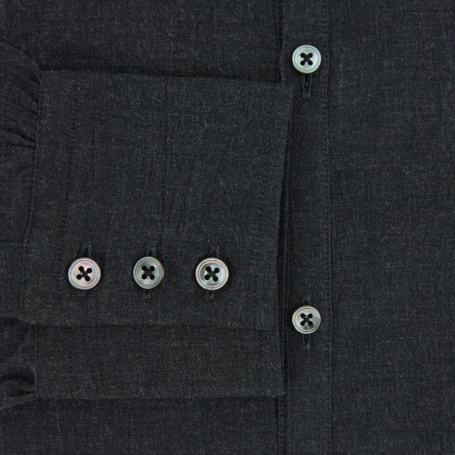 View 4 of product The Turnbull & Asser Midnight Blue Westminster Shirt features long sleeves, a button-up front, classic collar, and buttoned cuffs in a plain design—showcasing British craftsmanship—laid flat on a white background.