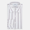 View 5 of product A Burgundy Track Stripe Mayfair Shirt by Turnbull & Asser, featuring long sleeves, vertical stripes, a classic collar, and crafted from premium Italian cotton, is displayed flat on a light background.