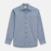 View 2 of product Close-up of Turnbull & Asser Blue Check Cotton Fabric, featuring a woven blue and white plaid pattern with intersecting lines and small white squares, displayed within a circular frame.