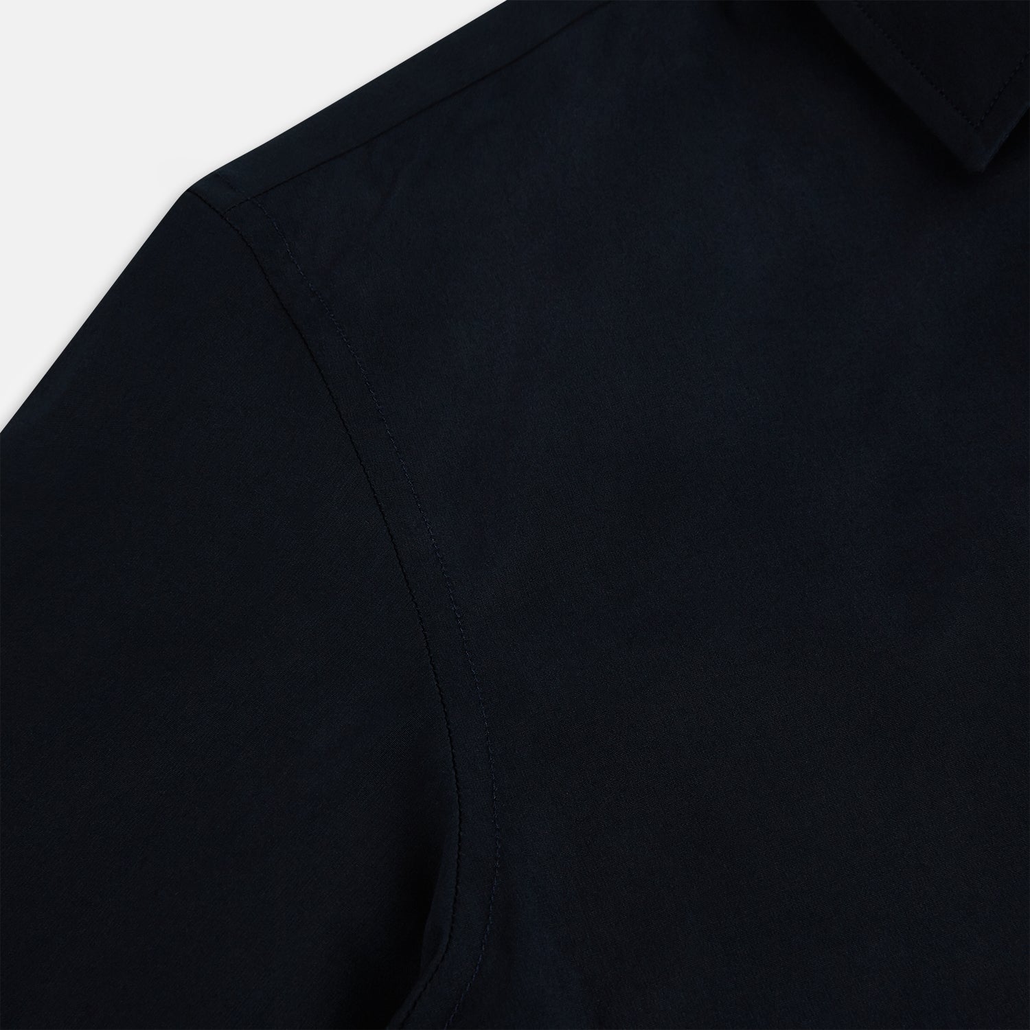 View 6 of product The DARK NAVY WINDSOR SHIRT by Turnbull & Asser is a long-sleeve shirt with a refined Windsor collar, showcasing classic British craftsmanship.