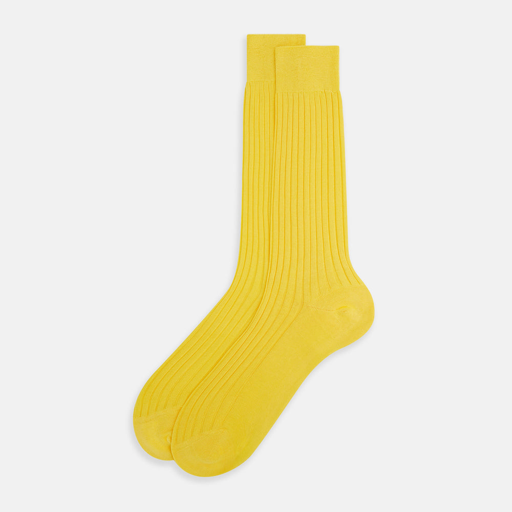 A single Charteuese Lemon Mid-Length Sock by Turnbull & Asser, knee-high and bright yellow with a ribbed Egyptian cotton texture, is displayed upright against a plain white background.
