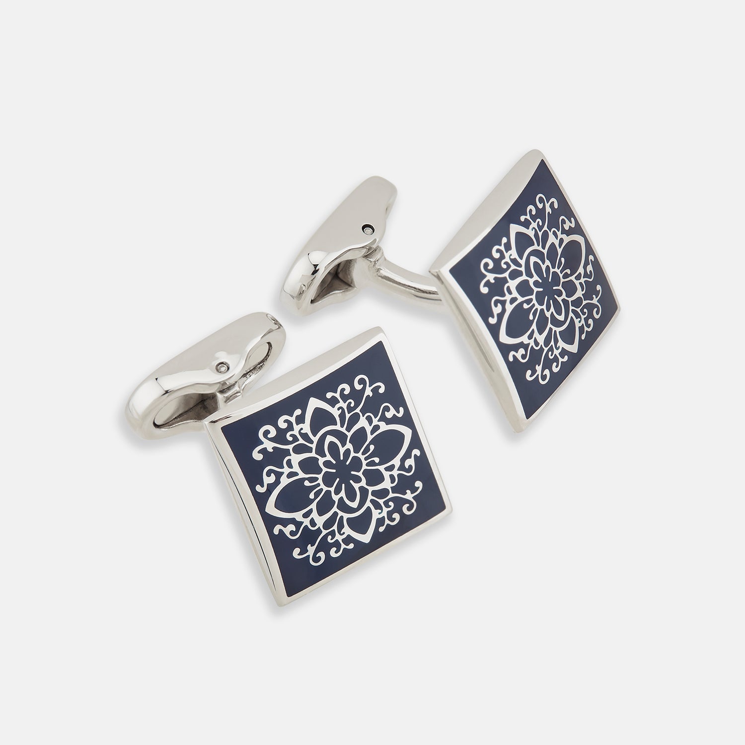 View 1 of product Turnbull & Asser Blue Floral Square Cufflinks feature a navy center with an intricate white floral pattern, accented by a sterling silver border.
