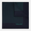 View 1 of product The Turnbull & Asser Navy and Hunter Green Stripe Silk Pocket Square features thin green stripes, hand-rolled edges, and "TURNBULL & ASSER HAND PRINTED IN ENGLAND" in green on the bottom right corner.