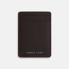 View 1 of product The Burgundy Two-slot Card Case by Turnbull & Asser features rich Italian leather with subtle maroon stitching and the brand embossed in white at the bottom, offering a refined minimalist accessory against a plain white background.