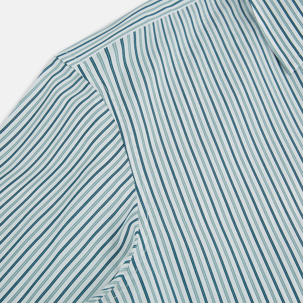 The GREEN DOUBLE STRIPE WESTMINSTER SHIRT by Turnbull & Asser features green and white vertical stripes, a pointed collar, buttoned cuffs, and a relaxed fit that highlights refined British craftsmanship.