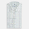 View 5 of product The Turnbull & Asser Dark Green Grid Check Mayfair Shirt features a white base with blue and dark green checks, a classic T&A collar, buttoned cuffs, and a Mayfair fit. The long-sleeve shirt is shown laid flat on a white background.
