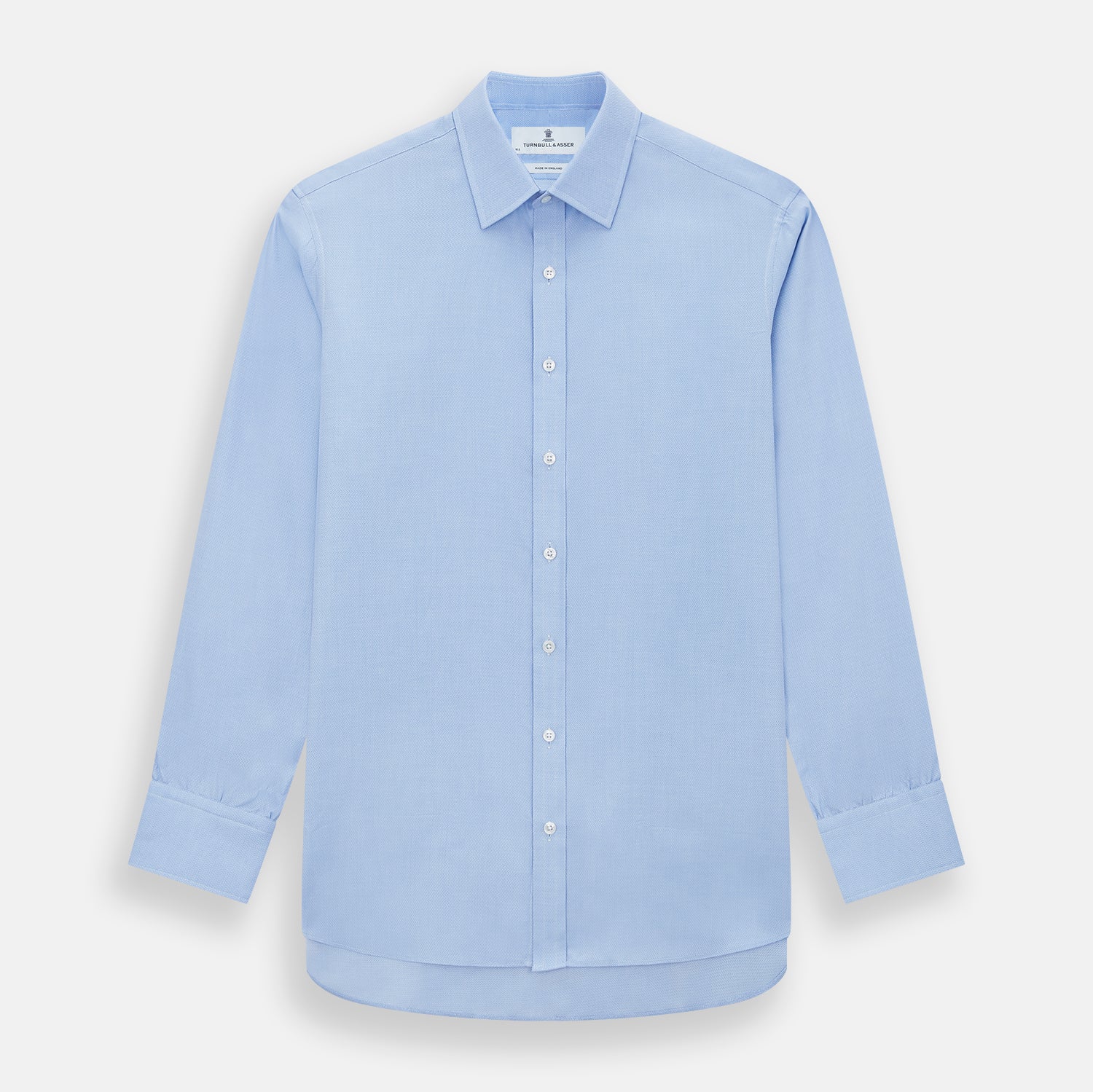 View 1 of product The Blue Herringbone Mayfair Shirt by Turnbull & Asser features light blue and white stripes, long sleeves, a classic collar, white buttons, and buttoned cuffs. Shown on a plain white background, it's perfect for formal occasions.