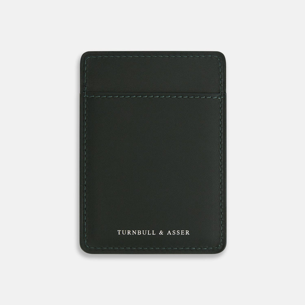 A slim, forest green Italian leather card case with visible stitching and TURNBULL & ASSER in white at the bottom, this minimalist accessory features a refined two-slot design against a plain white background.