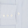 View 4 of product The Sky Blue Hairline Multi Stripe Mayfair Shirt by Turnbull & Asser, made from Italian cotton with a classic collar, white buttons, and buttoned cuffs, is displayed on a plain white background—an essential for any gentleman.