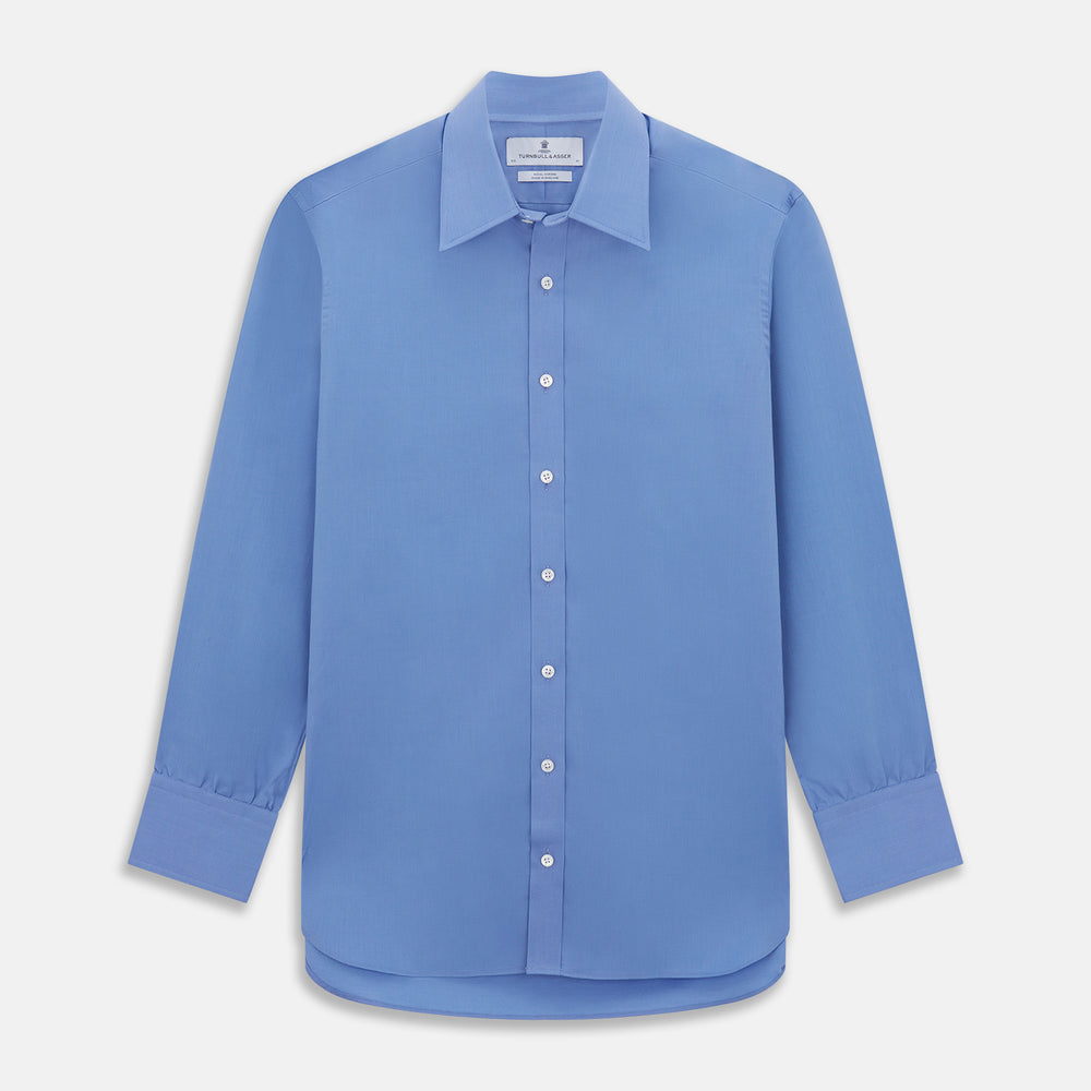 The World Is Not Enough Blue Cotton Istanbul Shirt by Turnbull & Asser, as seen on James Bond, features long sleeves, white buttons, a classic collar, and buttoned cuffs, shown against a plain white background.