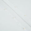 View 7 of product The Turnbull & Asser White Royal Oxford Cotton Windsor Shirt features a Turnbull open collar, long sleeves, 3-button cuffs, and a straight hem, shown against a plain white background.