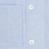 View 4 of product The Turnbull & Asser Pale Blue Linen Pyjama Shirt features long sleeves, a collar, front buttons, and a chest pocket—perfect as elegant loungewear or nightwear.