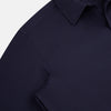 View 6 of product The Navy Textured Windsor Shirt by Turnbull & Asser features long sleeves, a Windsor collar, buttoned cuffs, and white buttons—a fine example of British craftsmanship—set against a plain white background.