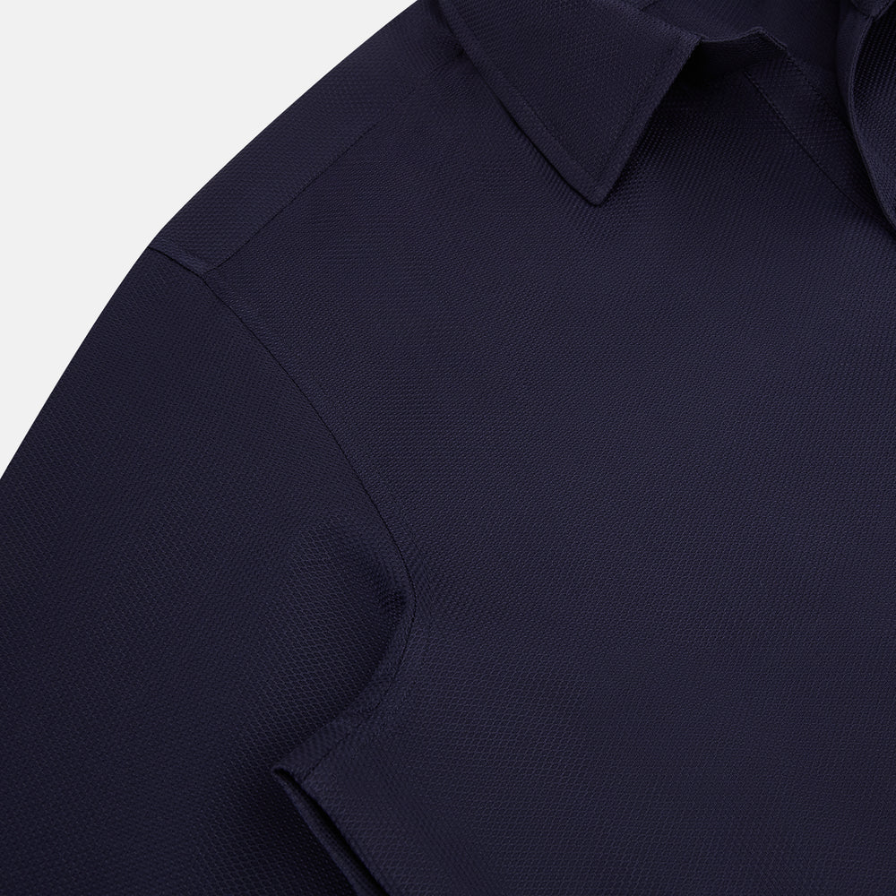 The Navy Textured Windsor Shirt by Turnbull & Asser features long sleeves, a Windsor collar, buttoned cuffs, and white buttons—a fine example of British craftsmanship—set against a plain white background.