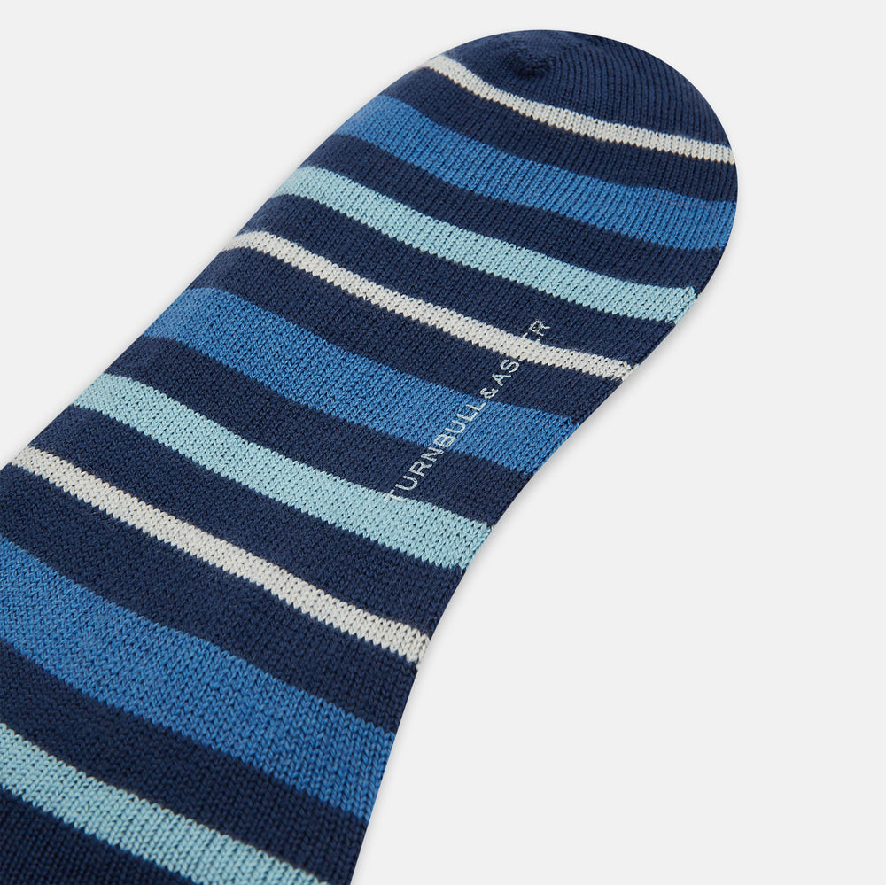 Turnbull & Asser's Azzurro Striped Merino Wool Long Socks feature horizontal stripes in blue, navy, and gray—ideal over-the-calf socks for everyday style.