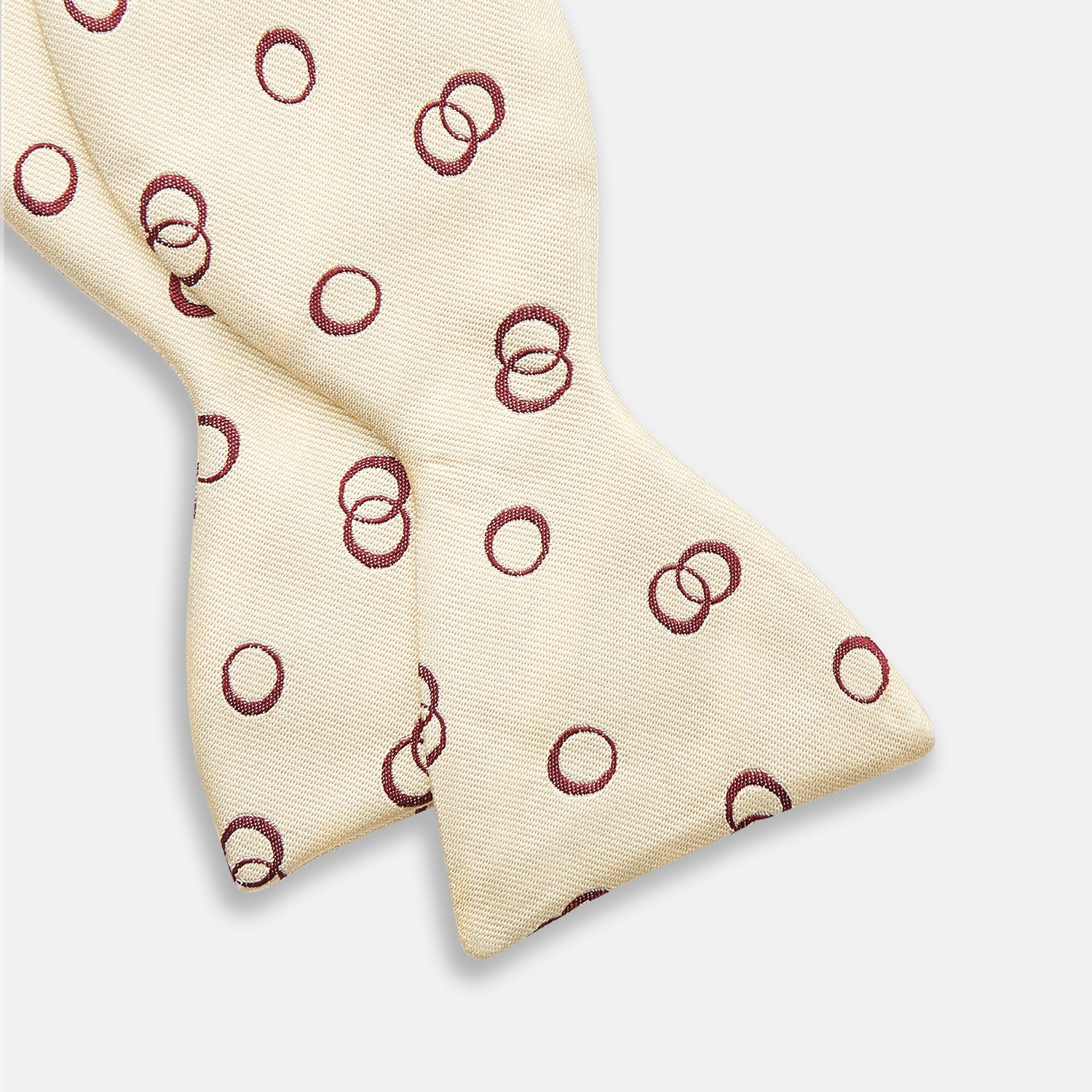 View 3 of product The Yellow Geometric Rings Silk Bow Tie by Turnbull & Asser features interlocking rings in a bold geometric pattern, crafted from silk.