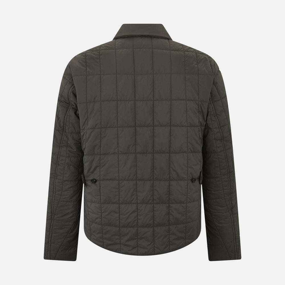The Battersea Shadow Grey Quilted Jacket by Turnbull & Asser features a front zipper, buttoned cuffs, pointed collar, and multiple pockets—an ideal choice for the modern gentleman. Shown on a plain white background.