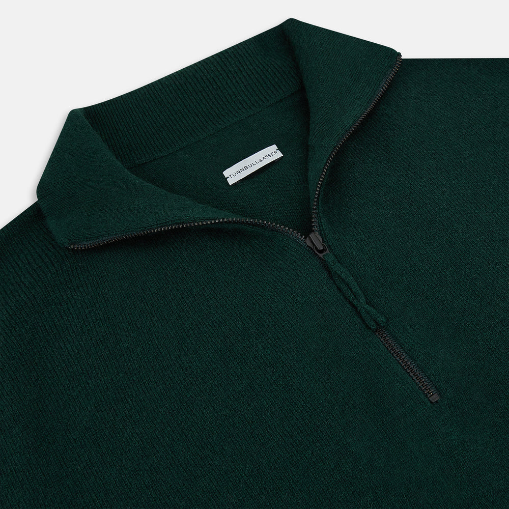 The Turnbull & Asser Forest Green Half-Zip Cashmere Jumper features a long-sleeve design and high collar with a sleek half-zip front, shown against a plain white background.