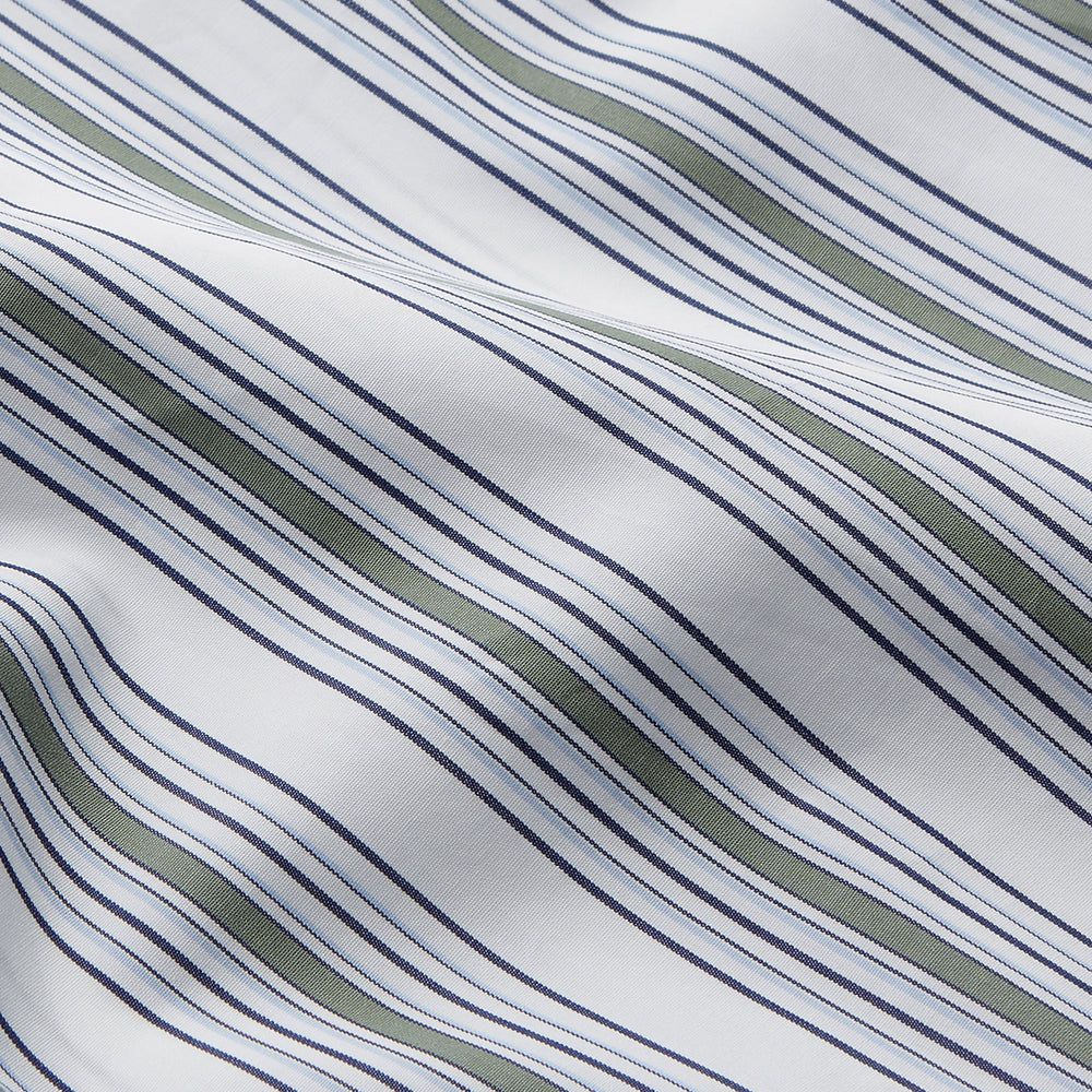The Turnbull & Asser Green Multi Stripe Regular Fit Shirt features a T&A collar, 3 button cuffs, long sleeves, and vertical blue, green, and white stripes. Laid flat on a white background.