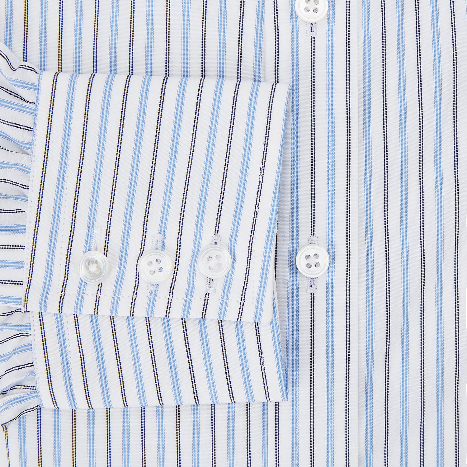 View 4 of product The Turnbull & Asser Blue Multi Halo Stripe Mayfair Shirt features long sleeves, a T&A collar with pointed tips, and buttoned cuffs, shown on a plain white background.