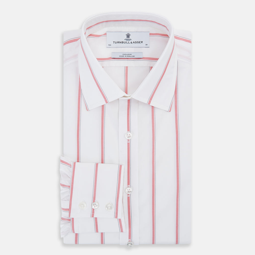 The Turnbull & Asser Coral Track Stripe Mayfair Shirt features a white Italian cotton fabric with vertical red stripes and a pointed T&A collar, shown against a plain light background.