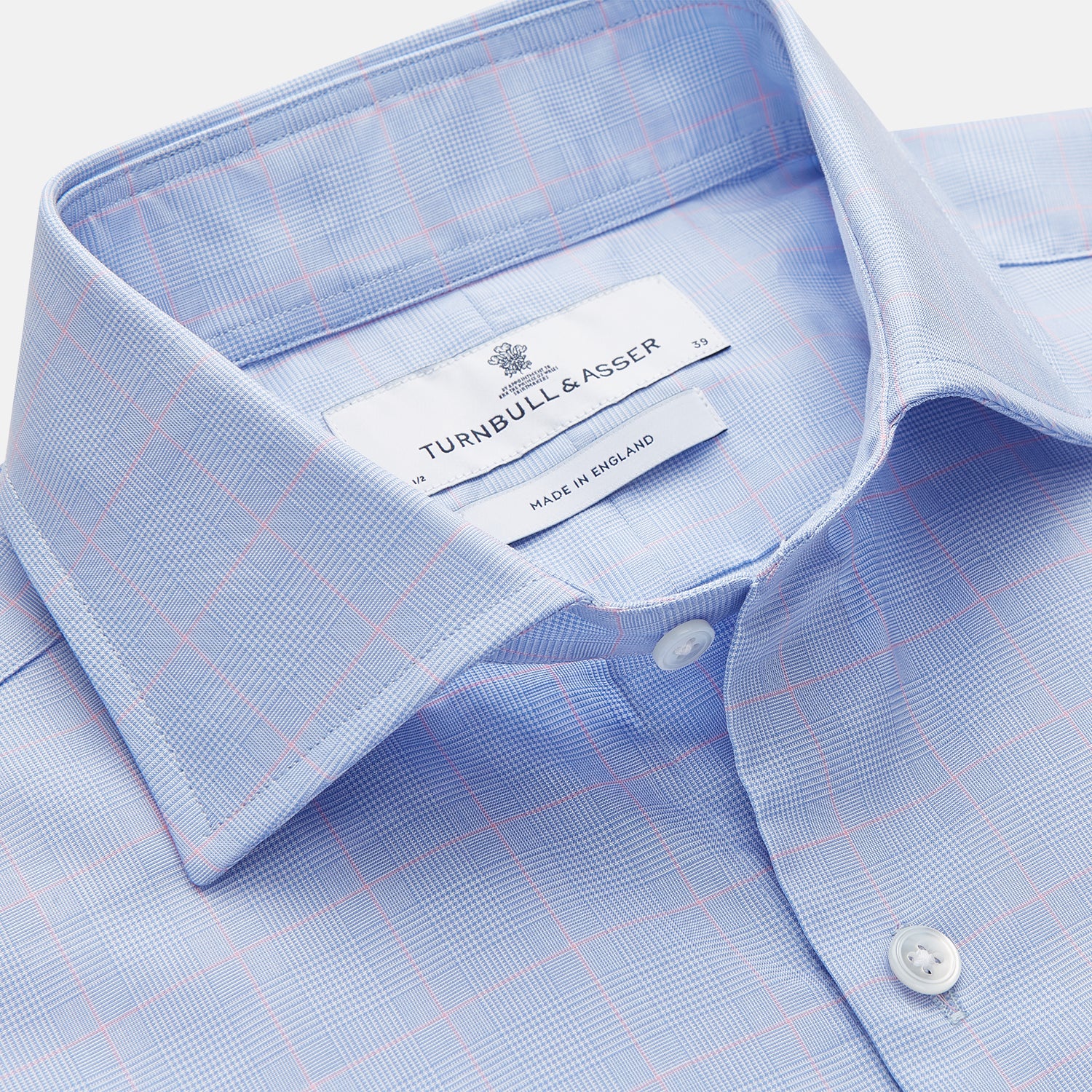 View 2 of product A Blue and Red Prince of Wales Check Mayfair Shirt by Turnbull & Asser, featuring long sleeves, a spread collar, buttoned cuffs, and button-up front, is laid flat on a white background.