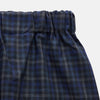 View 2 of product Turnbull & Asser’s Blue Multi Check Wool Hasting Pyjama Trousers, featuring an elastic waistband, are laid flat on a white background.
