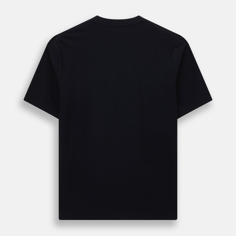 A navy short-sleeve pyjama shirt by Turnbull & Asser is laid flat on a white background, displaying the front view. Its soft fabric ensures comfort with no visible logos, designs, or patterns on the shirt.
