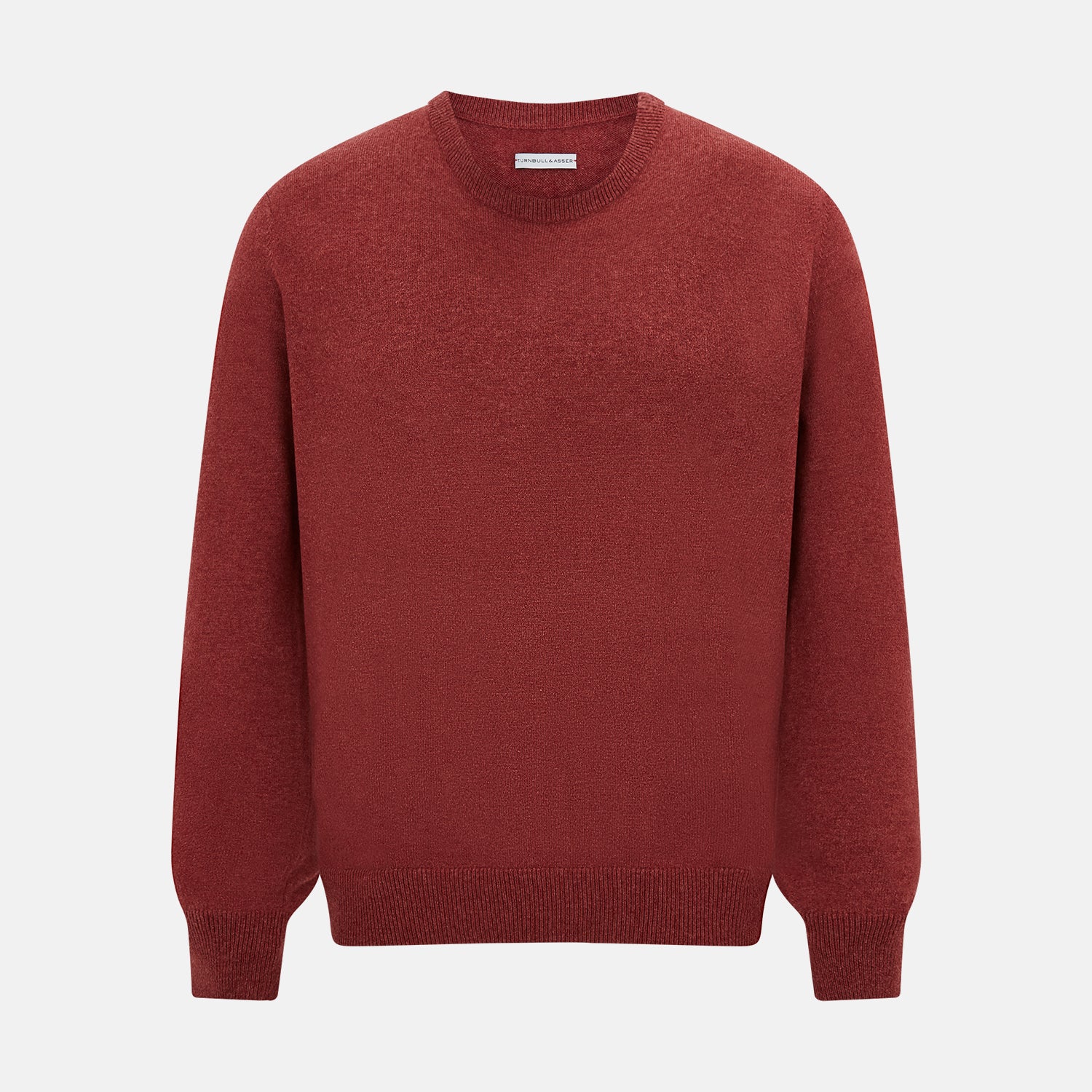 View 1 of product The Turnbull & Asser Crimson Red Cashmere Round Neck Jumper is a classic men’s knitwear piece, featuring long sleeves and a solid crimson hue, shown against a white background.