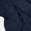 View 8 of product A Navy John Arthur Trench Coat by Turnbull & Asser, featuring a collar, button closure, adjustable cuff straps, two slanted front pockets, and a chest zip pocket, is displayed flat on a white background.