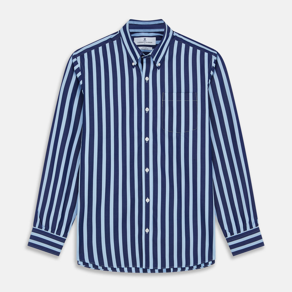 Close-up of Turnbull & Asser’s Navy Wide Stripe Cotton Fabric, showing textured, slightly wavy horizontal stripes in light and dark blue through a circular frame.