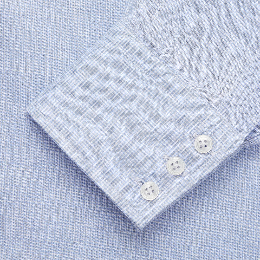 Turnbull & Asser's Pale Blue Check Linen Regular Fit Mayfair Shirt features a classic collar, front pocket, and buttoned cuffs—a breezy update to the traditional check shirt.