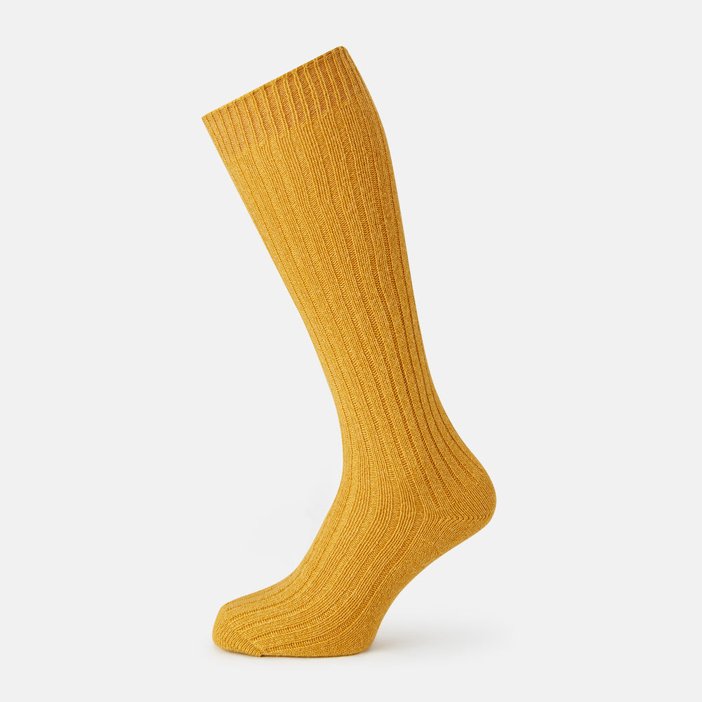 A single Turnbull & Asser CASHMERE/COTTON BLEND OCHRE SOCK, knee-high and ribbed, is shown upright on a white background.