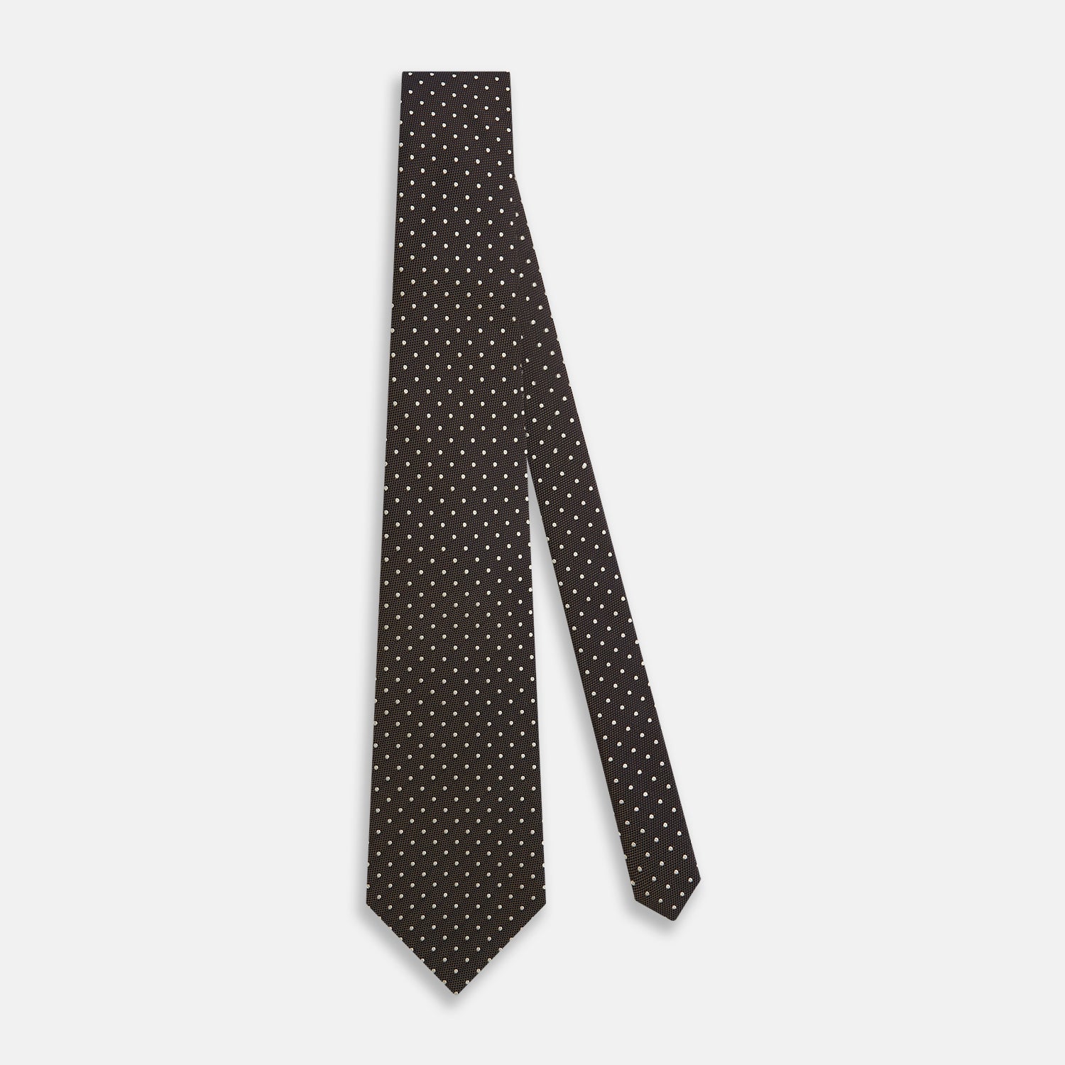 View 2 of product The Turnbull & Asser White and Brown Micro Dot Silk Tie features a refined micro dot pattern—an essential accessory for any men's wardrobe.