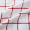 View 6 of product The Turnbull & Asser Dark Red Grid Check Mayfair Shirt is a long-sleeve white shirt made from Italian cotton, featuring a bold dark red grid pattern, button-down front, and classic collar, shown laid flat on a white background.