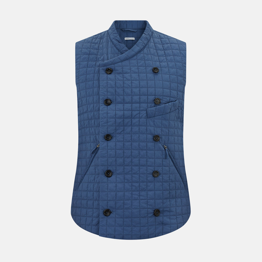 The Turnbull & Asser Azzurro Double-Breasted Quilted Gilet features a sleeveless blue design, black buttons, two zipped waist pockets, and a chest pocket—ideal for men's layering—shown against a white background.