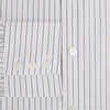 View 4 of product The Turnbull & Asser Midnight Blue and Red Ticking Stripe Mayfair Shirt features long sleeves, a pointed collar, buttoned cuffs, and fine Italian cotton—an essential men's wardrobe piece shown on a plain white background.