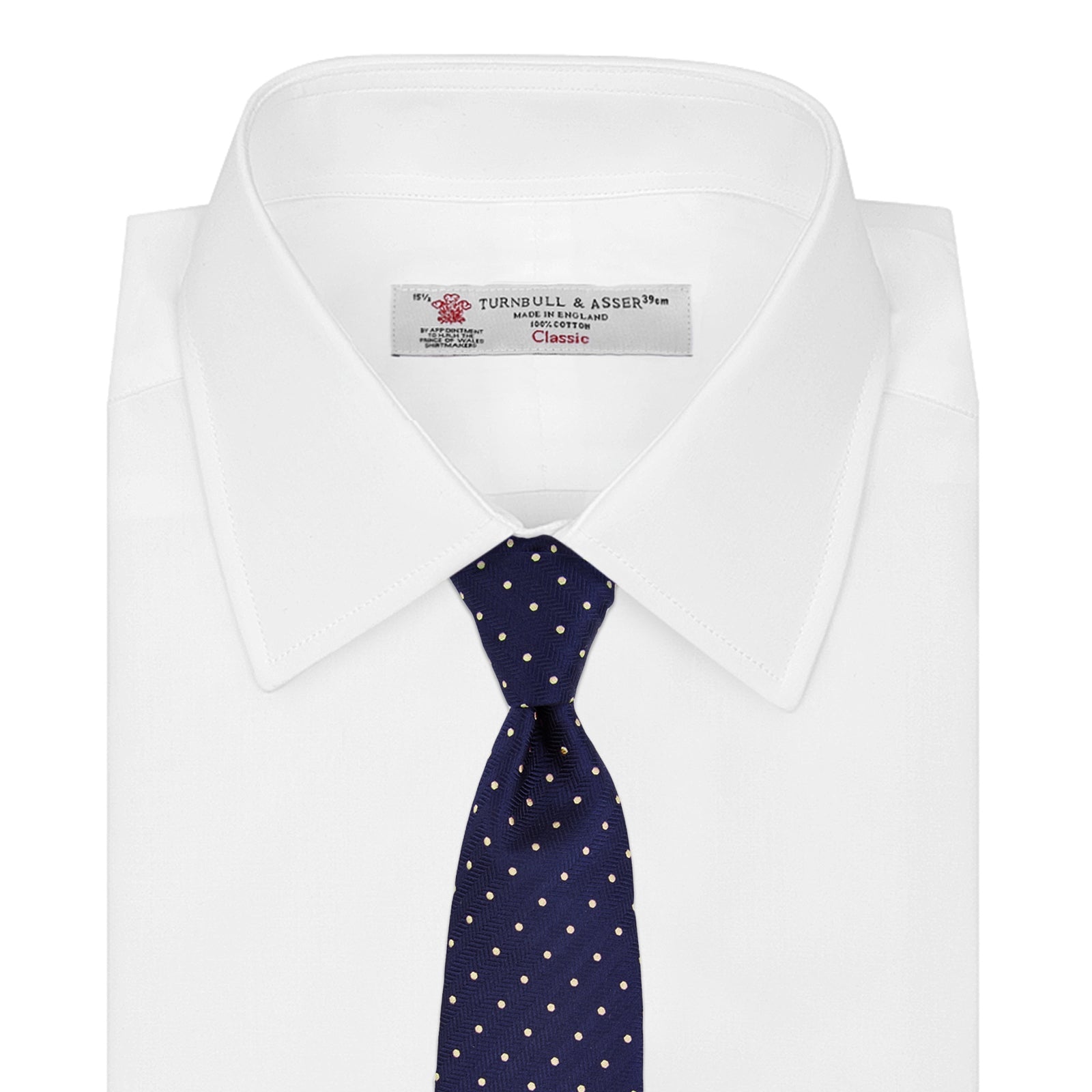 View 2 of product The Turnbull & Asser Navy Spot Woven Herringbone Silk Tie features a navy blue base with evenly spaced yellow polka dots, making it an essential accessory for smart attire. Displayed rolled on a white background.