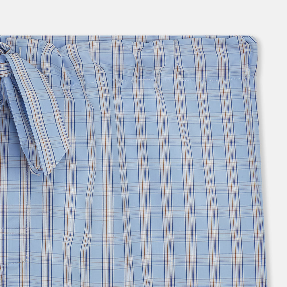 Turnbull & Asser Pale Blue Multi Check Cotton Duffield Pyjama Shorts feature a comfortable elastic and drawstring waist, with thin white and light red lines in the cotton fabric forming checks. The shorts are displayed against a plain white background.
