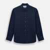 View 1 of product The Navy Linen Westminster Shirt by Turnbull & Asser features a classic collar and buttoned cuffs, exemplifying British craftsmanship. Shown here in long sleeves, the shirt is displayed flat against a white background.