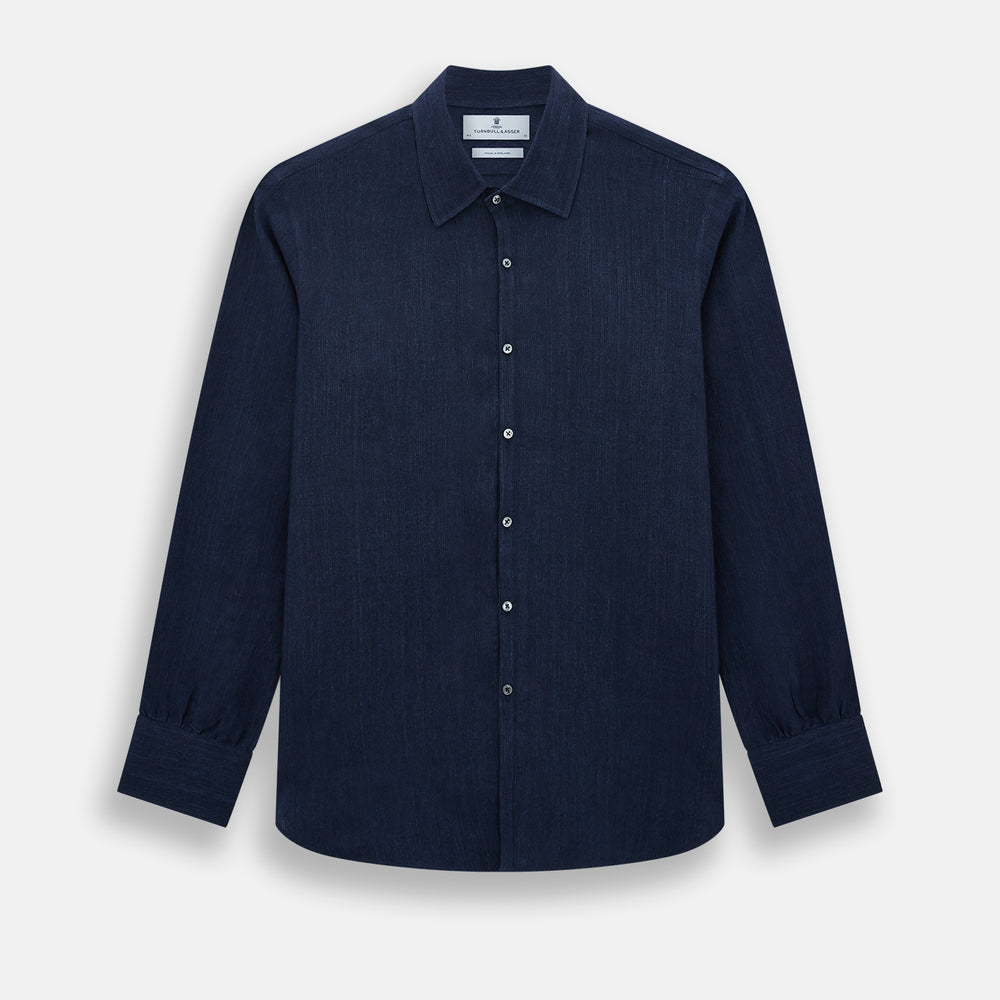 The Navy Linen Westminster Shirt by Turnbull & Asser features a classic collar and buttoned cuffs, exemplifying British craftsmanship. Shown here in long sleeves, the shirt is displayed flat against a white background.