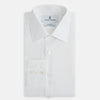 View 5 of product The Turnbull & Asser White Linen Mayfair Shirt features long sleeves and a classic collar, shown on a flat white background.
