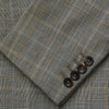 View 3 of product The Turnbull & Asser Beige Wool Prince-of-Wales Check Jacket is a single-breasted blazer with a notched lapel, one-button closure, two front flap pockets, and sleeve button details—an ideal lightweight summer jacket.