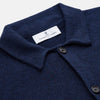 View 2 of product The Turnbull & Asser Navy Cashmere Knitted Traditional Pyjama Set features a long-sleeve camp collar shirt with front pockets and matching drawstring pants, offering an elevated twist on classic loungewear.